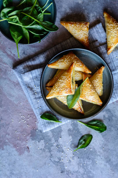 istock Spanakopita triangles stuffed with spinach and Feta cheese 1040000056