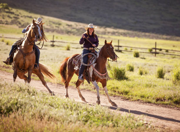 istock Cowgirls Horseback Riding 1040018438