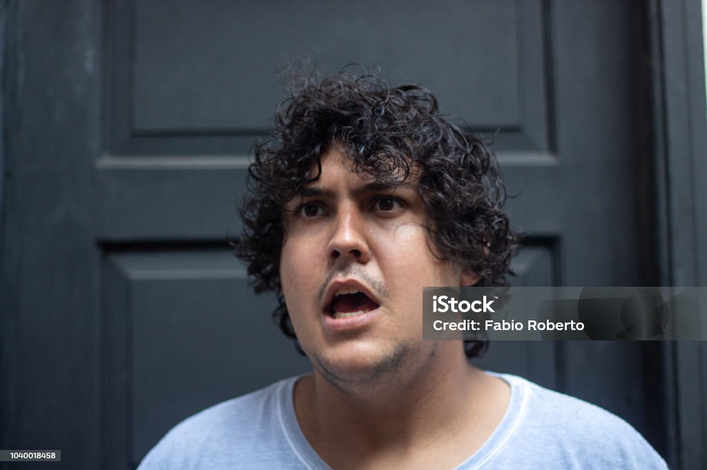 Man with his messy hair Man with his messy hair after awake Tangled Hair Stock Photo