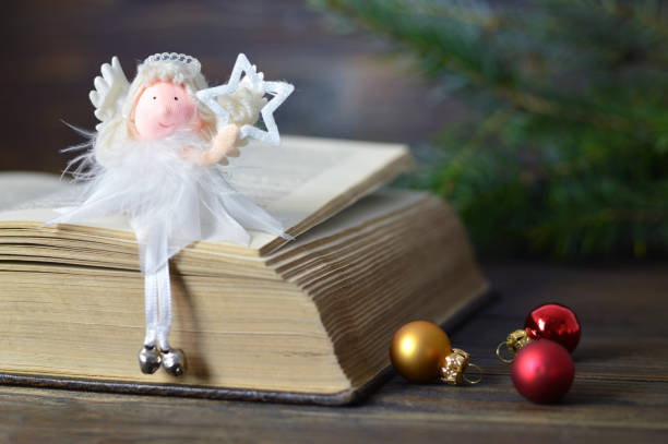 istock Christmas card with an angel and a star 1040018568