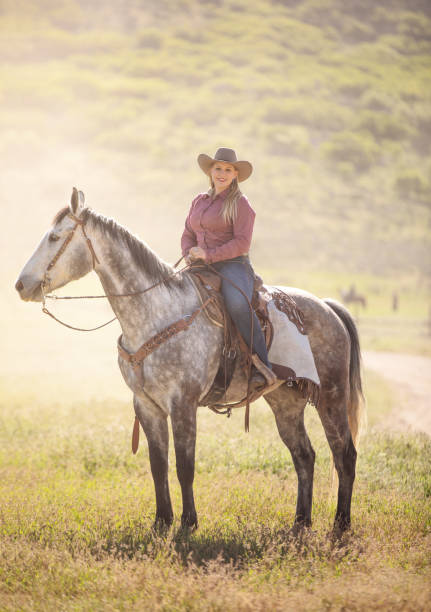 istock Cowgirl Horseback Riding 1040018628