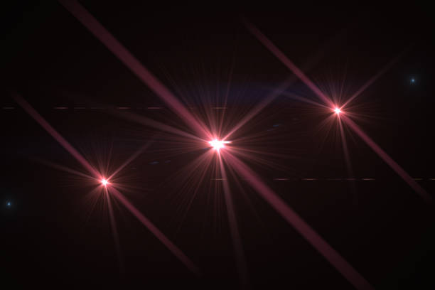 istock Lens Flare, Star Lights, Abstract Black Background 1040027350