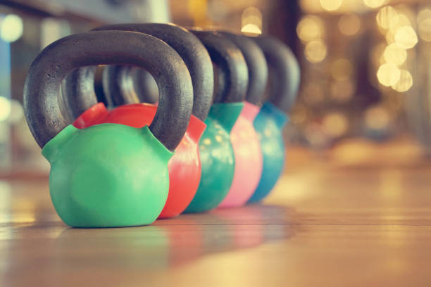 istock Colorful kettlebells in gym 1040027620