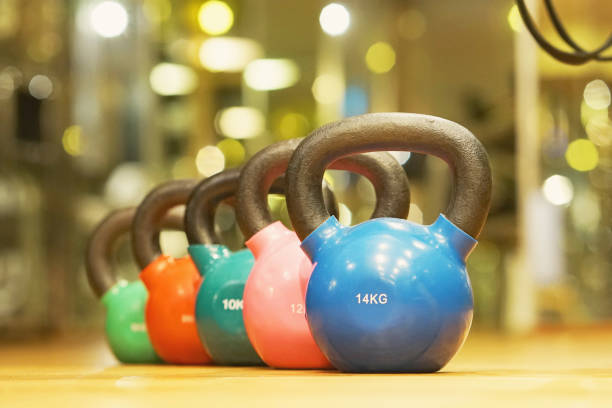 istock Colorful kettlebells in gym 1040028000