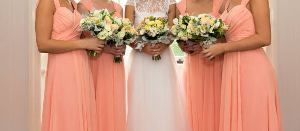 istock Bridal Party Holding Bouquets 1040032914