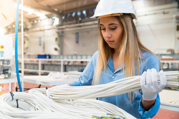 istock Young Woman Working at Factory 1040045734