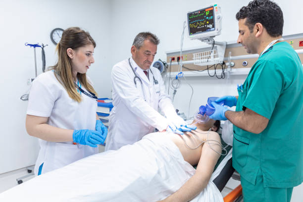 istock Doctors in emergency room working on unconscious patient 1040071392