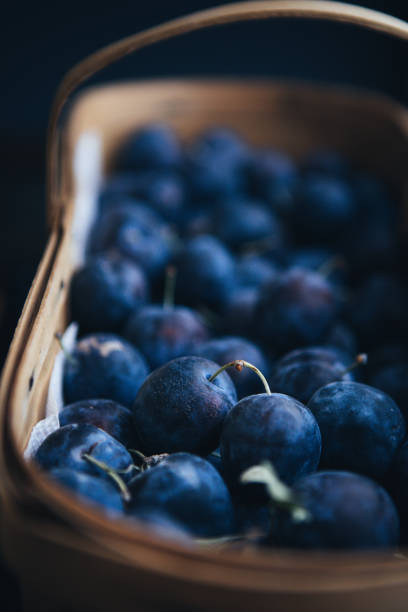 istock Fresh Damson Plums In A Basket 1040076302