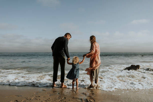 istock Happy family at a beach 1040078994