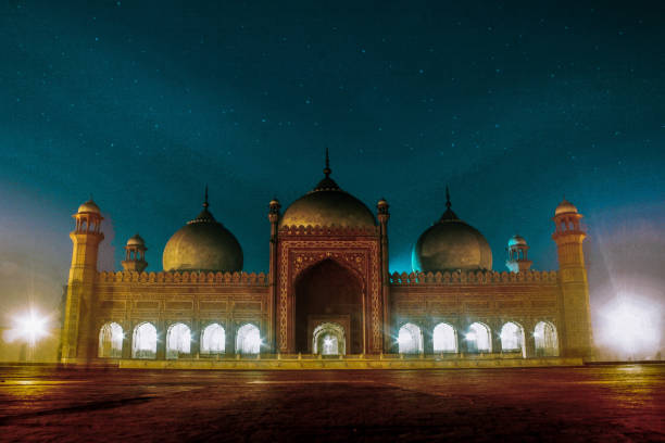 Beautiful Badshahi Mosque With Sky At Night In Lahore stock photo