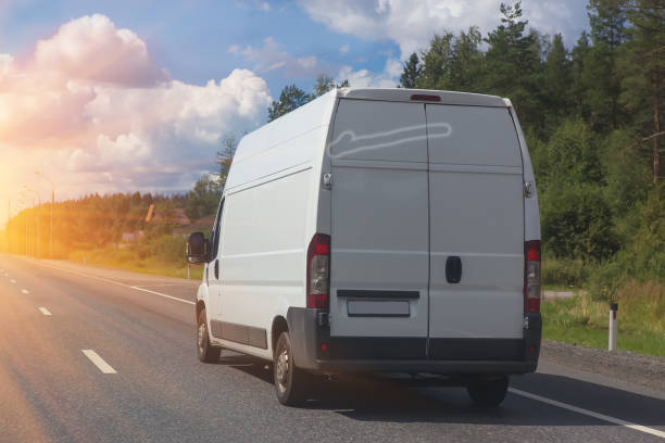 istock minibus goes on the country highway 1040079606