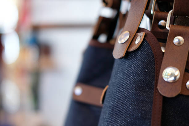 istock blue jeans denim & brown leather apron 1040084618