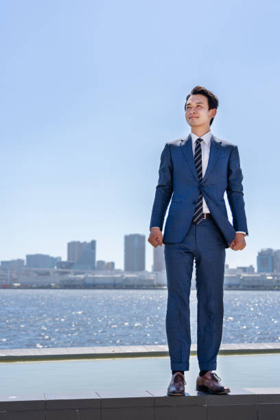 istock asian businessman relaxing in blue sky 1040090002