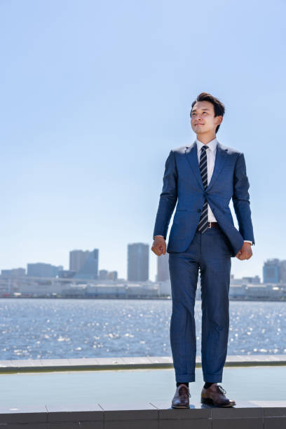 istock asian businessman relaxing in blue sky 1040090016