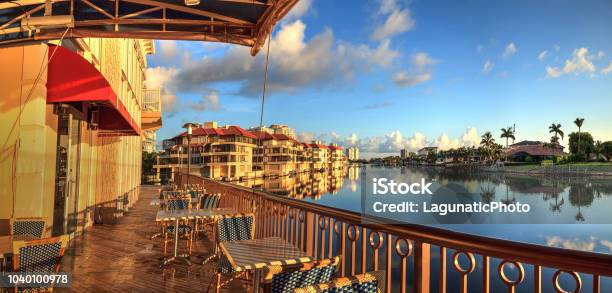 Restaurant On The Water Along The Village At Venetian Bay Stock Photo - Download Image Now