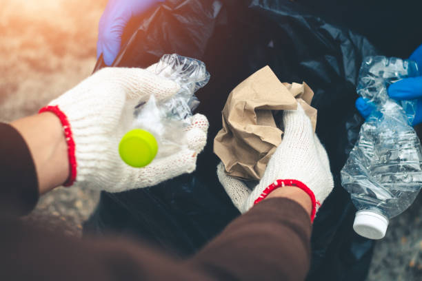 istock Group women volunteer help garbage collection charity environment. 1040152512