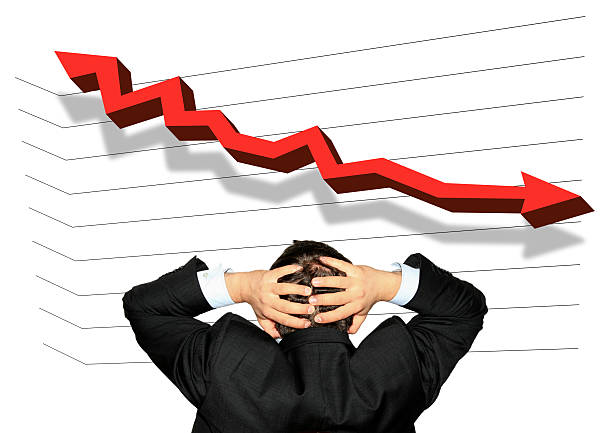 Stock exchange crash Young businessman with hands on back of his head worried because of business failure... just do it stock pictures, royalty-free photos & images