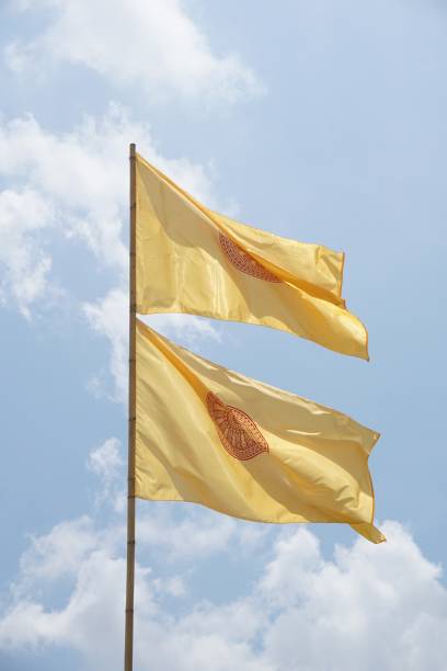 istock buddhist yellow flag on blue sky 1040194508