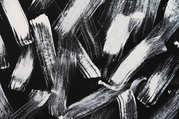 istock abstract wallpaper painted by white brush on black background texture. 1040197084