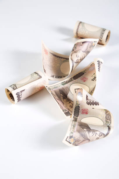istock Japanese Yen bills on white background 1040212662