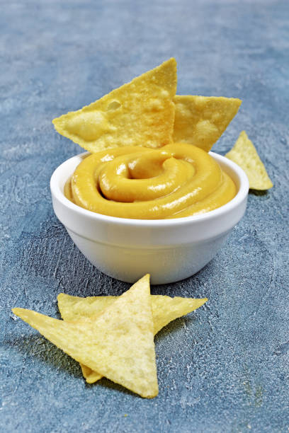 istock Mexican nachos chips with cheese sauce or dip 1040214352