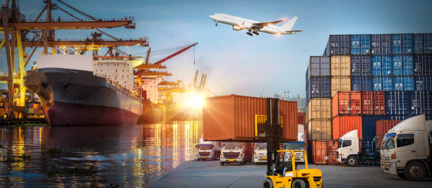 istock Logistics and transportation of Container Cargo ship and Cargo plane with working crane bridge in shipyard at sunrise, logistic import export and transport industry background 1040217786