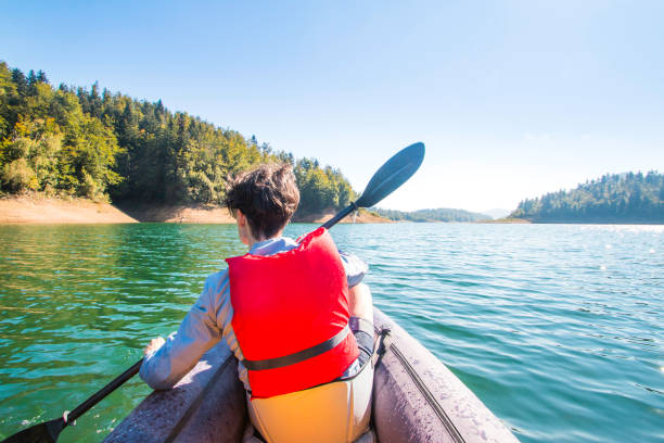 istock Strong young girl kayaking 1040218082