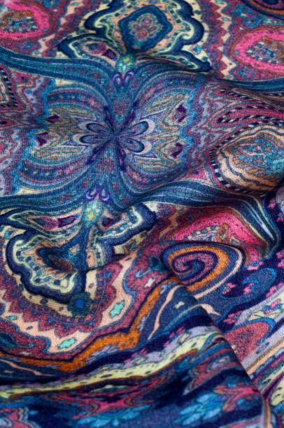 istock Background texture, pattern. paisley fabric of blue color with a floral pattern. Presenting a vibrant 70's power print that will revitalize your interior space. Soft with subtle texture 1040226508