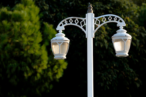 White color street lamp in the garden, Turkey.