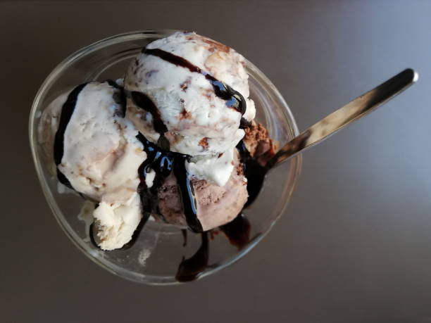 istock Ice cream balls in a bowl with spoon 1040247220