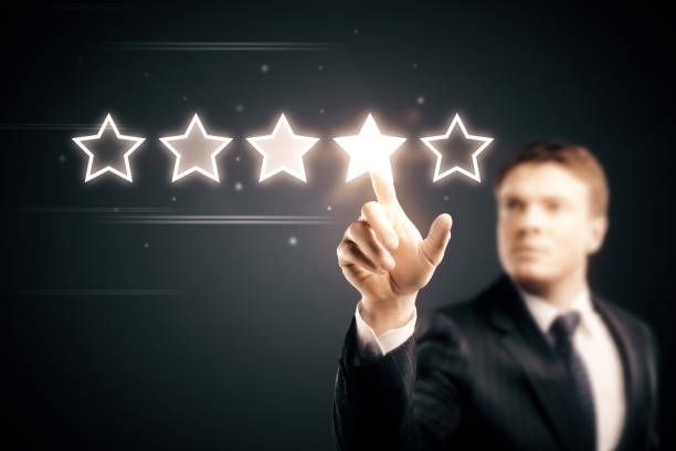 istock businessman pointing 5 star symbol 1040249836