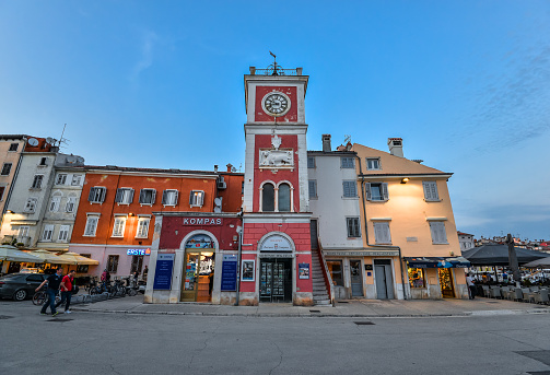 Rovinj, Croatia - May 22, 2018: View on bright building exteriors of Coastal town of Rovinj, Istria, Croatia. Rovinj - beautiful antique city. Cororful building facades in old town of Rovinj