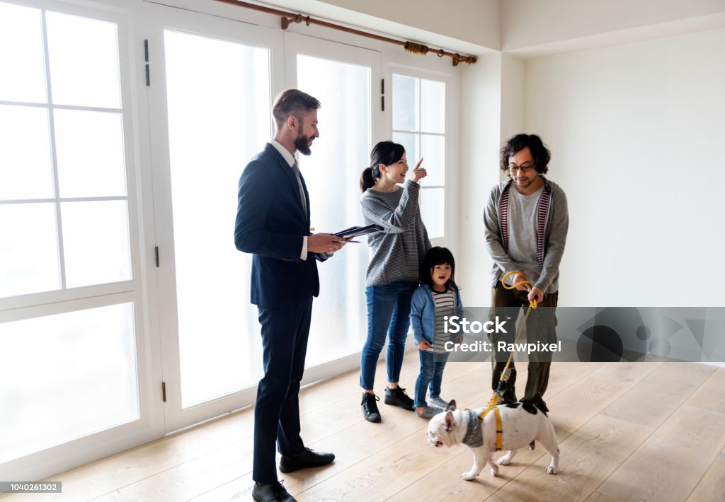 Asian family buy new house Real Estate Agent Stock Photo
