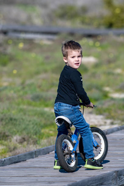 istock boy on bike 1040261916