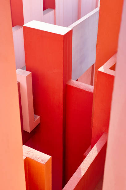 Geometric building design. The red wall, La manzanera. Calpe, Spain