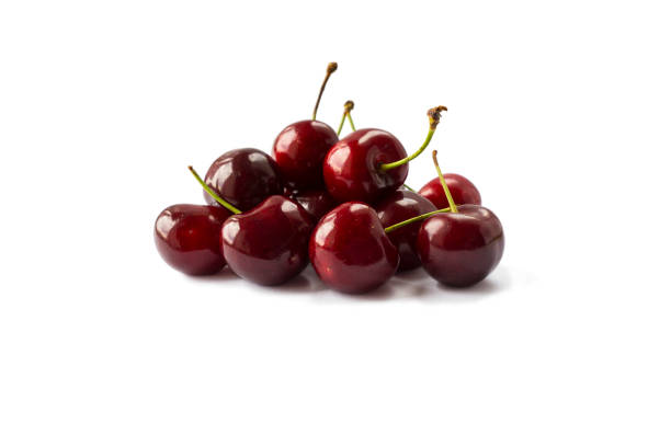 istock Fresh red cherries lay on white isolated background. Ripe cherry on a white background. Cherries with copy space for text. 1040266506