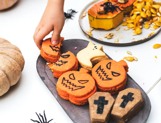 istock Little kids at a Halloween party 1040269478