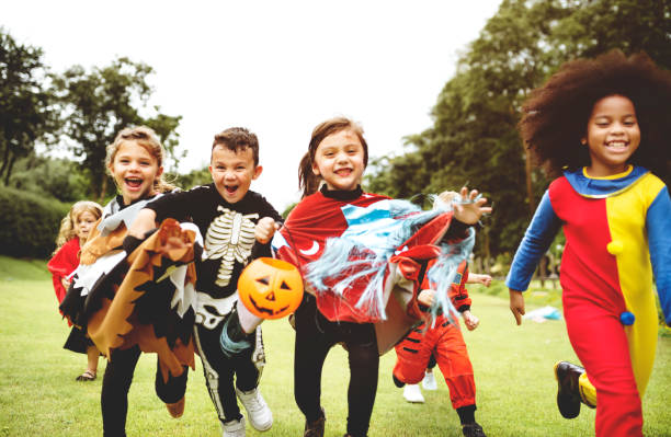 istock Little kids at a Halloween party 1040269568