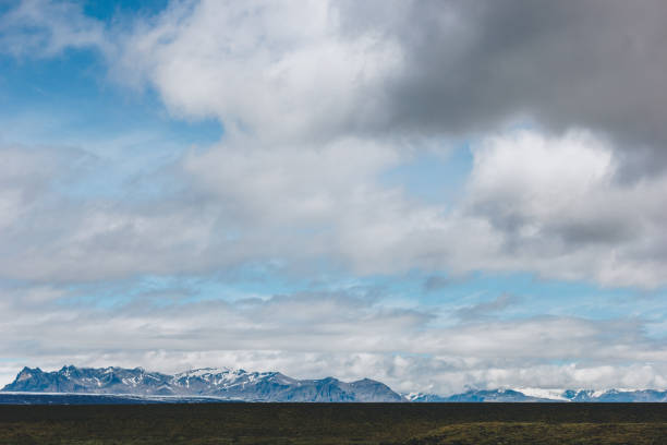 istock landscape with mountains covered by snow under cloudy sky in Iceland 1040271012