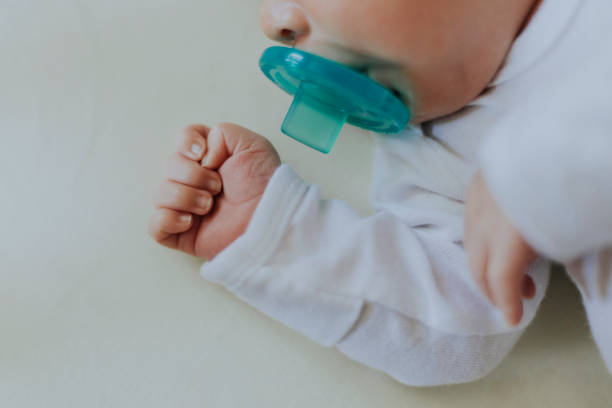 istock Peaceful baby sleeping in a crib 1040276074