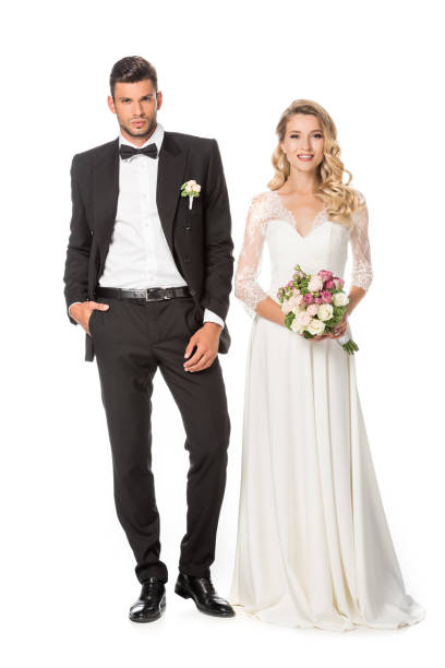 istock attractive happy young bride and groom isolated on white 1040288346