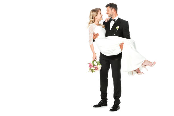 istock happy young groom carrying his bride isolated on white 1040288978