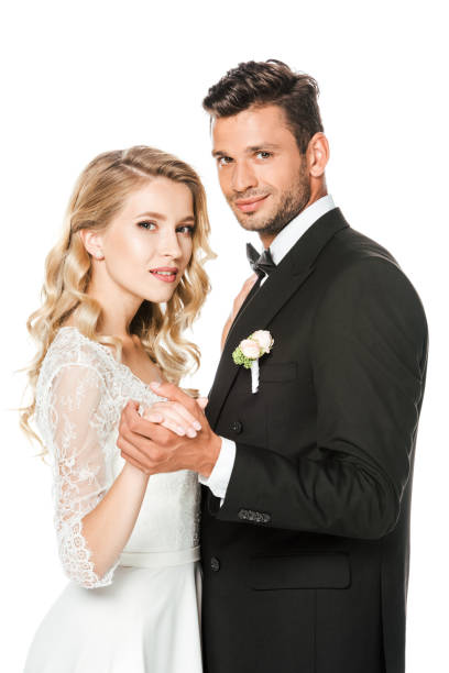 istock smiling young bride and groom dancing isolated on white 1040289008