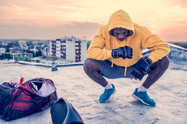 istock man wearing a hoodie resting after workout 1040290634
