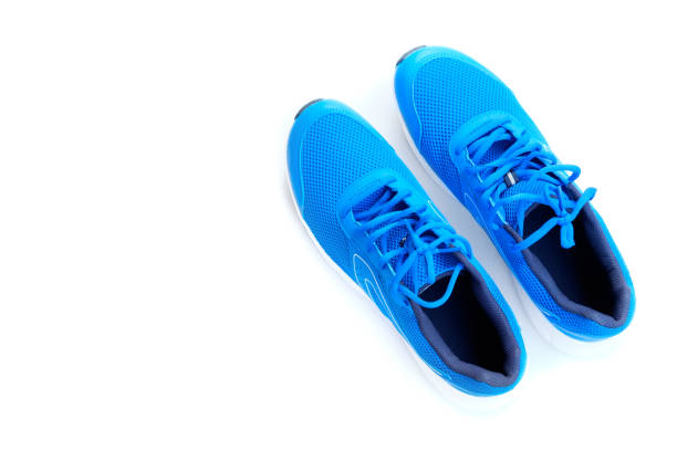 istock blue running shoes for men on a white background 1040298760