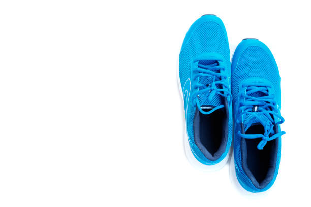 istock blue running shoes for men on a white background 1040298762