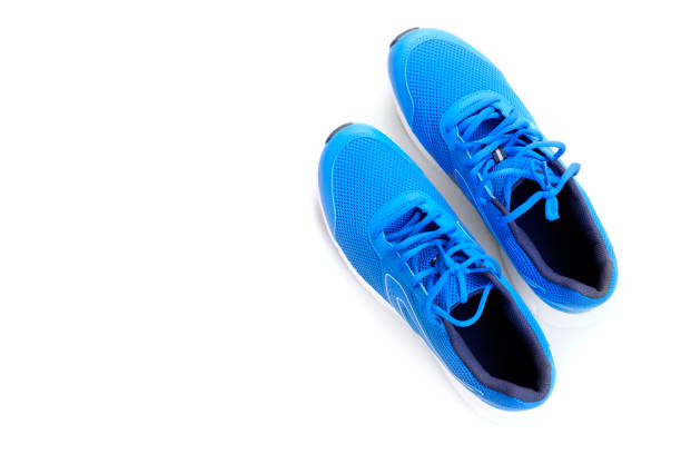 istock blue running shoes for men on a white background 1040298778