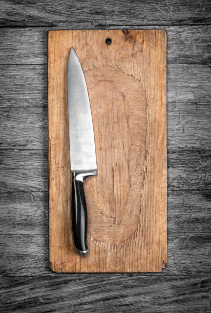 cuchillo con tablero de madera - flash menu flash fotografías e imágenes de stock