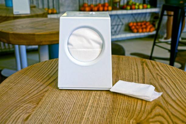 istock white paper napkins on a brown table in a restaurant 1040300532