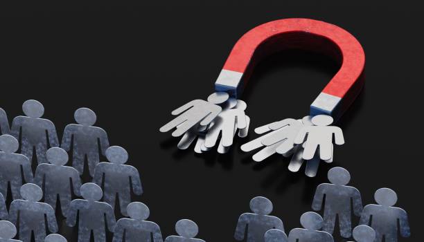 istock People or clients are attracted by magnet. Marketing concept. 3D rendered illustration. 1040303348